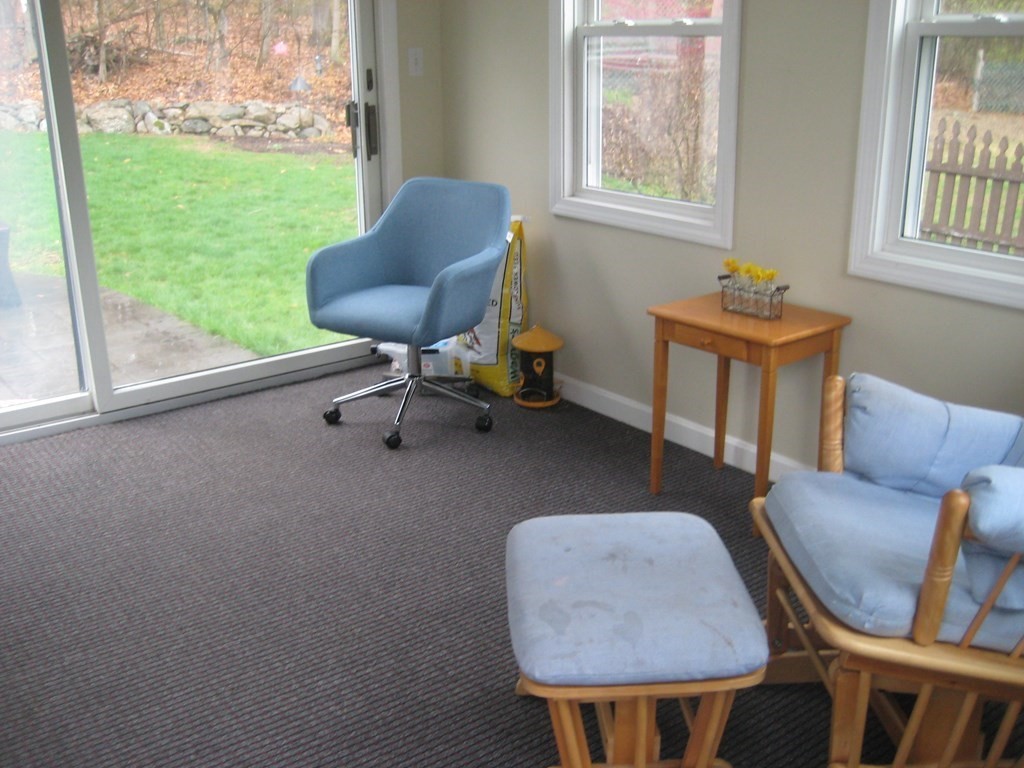 107 Causeway Street Hudson, MA 01749 - Photo 21 of 21 a living room with furniture and a window