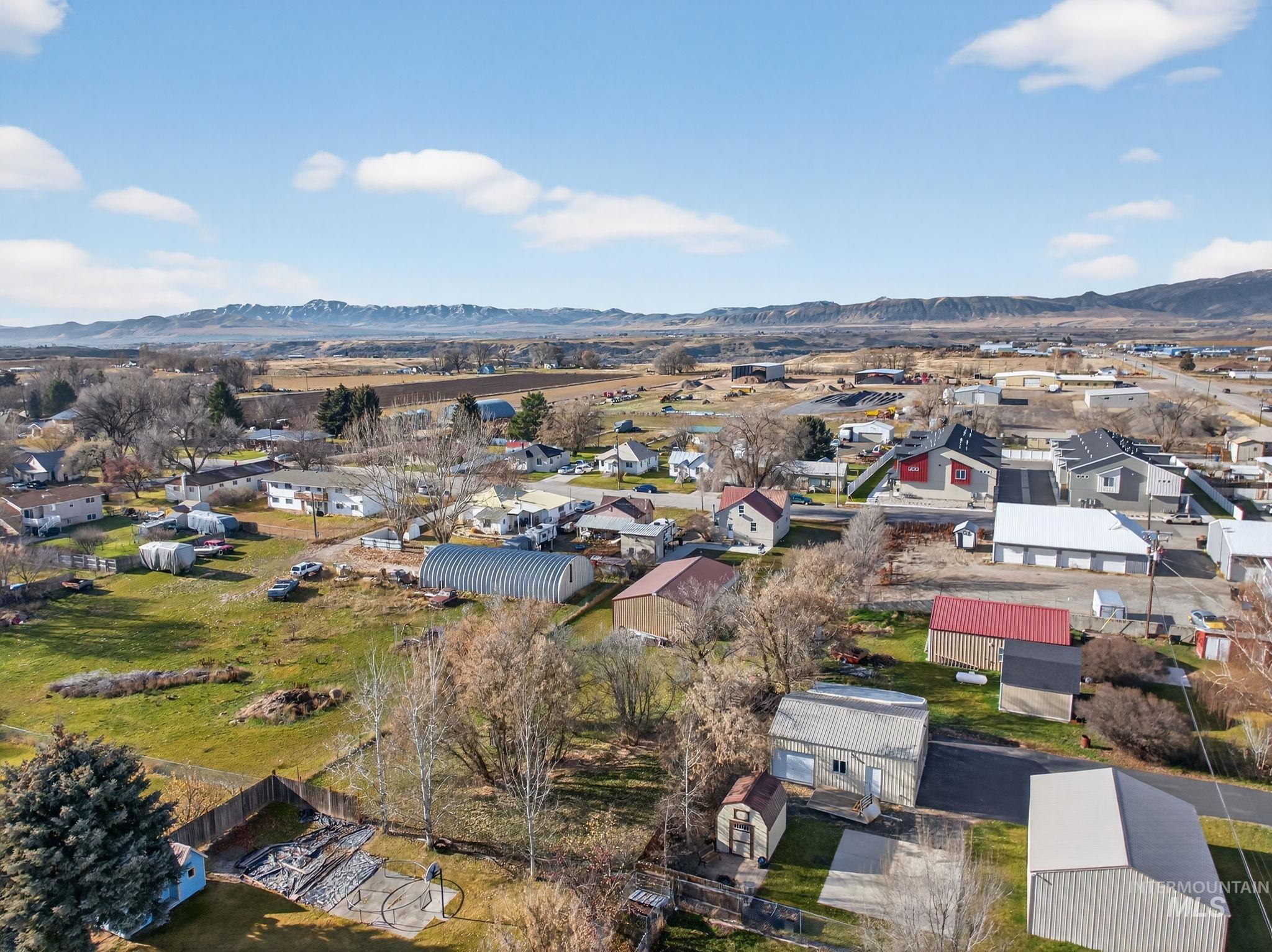 49 South 4th Street West Preston, ID 83263 - Photo 37 of 48 Aerial perspective of suburban area with mountains