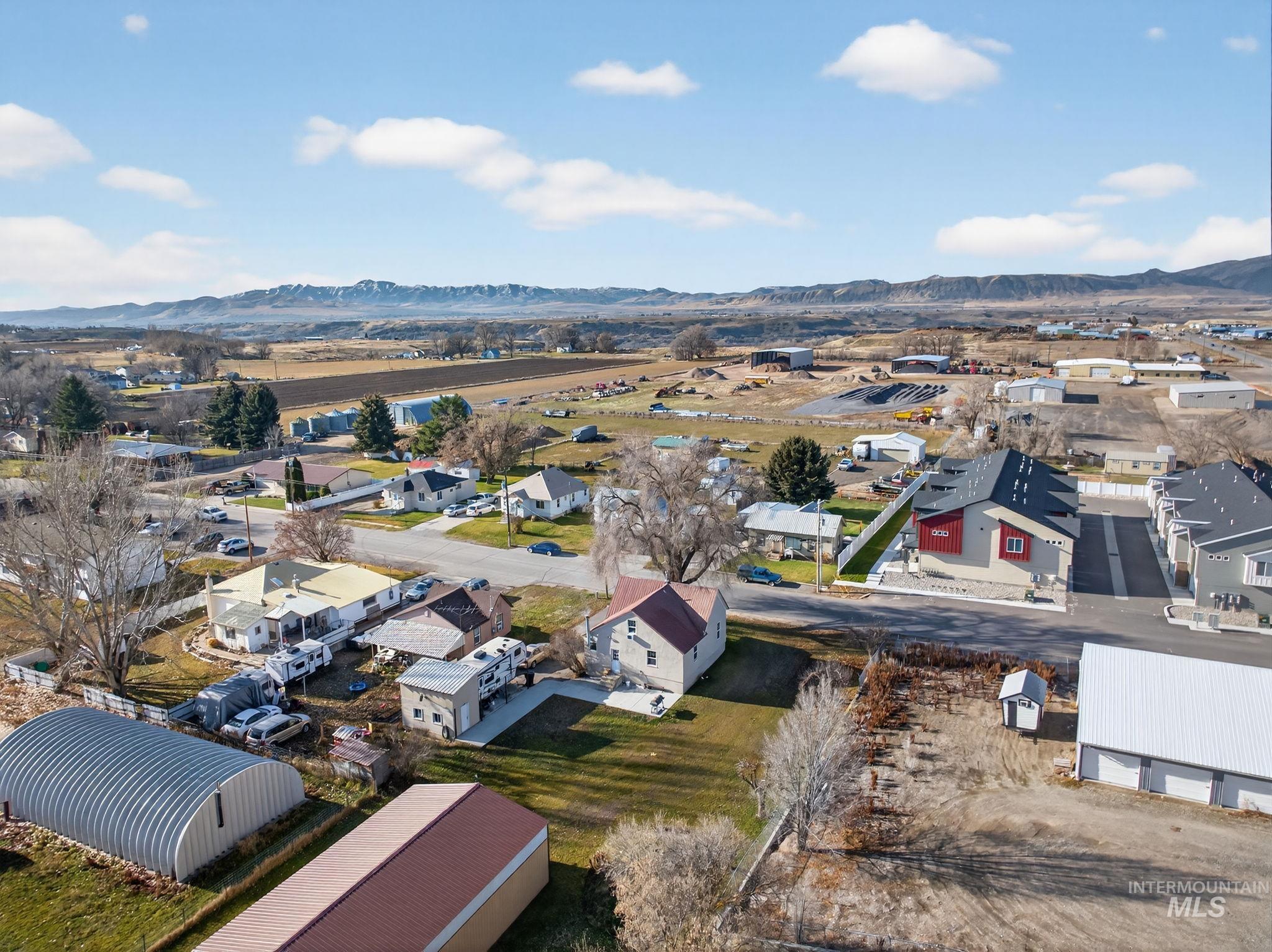 49 South 4th Street West Preston, ID 83263 - Photo 39 of 48 Aerial perspective of suburban area with a mountainous background