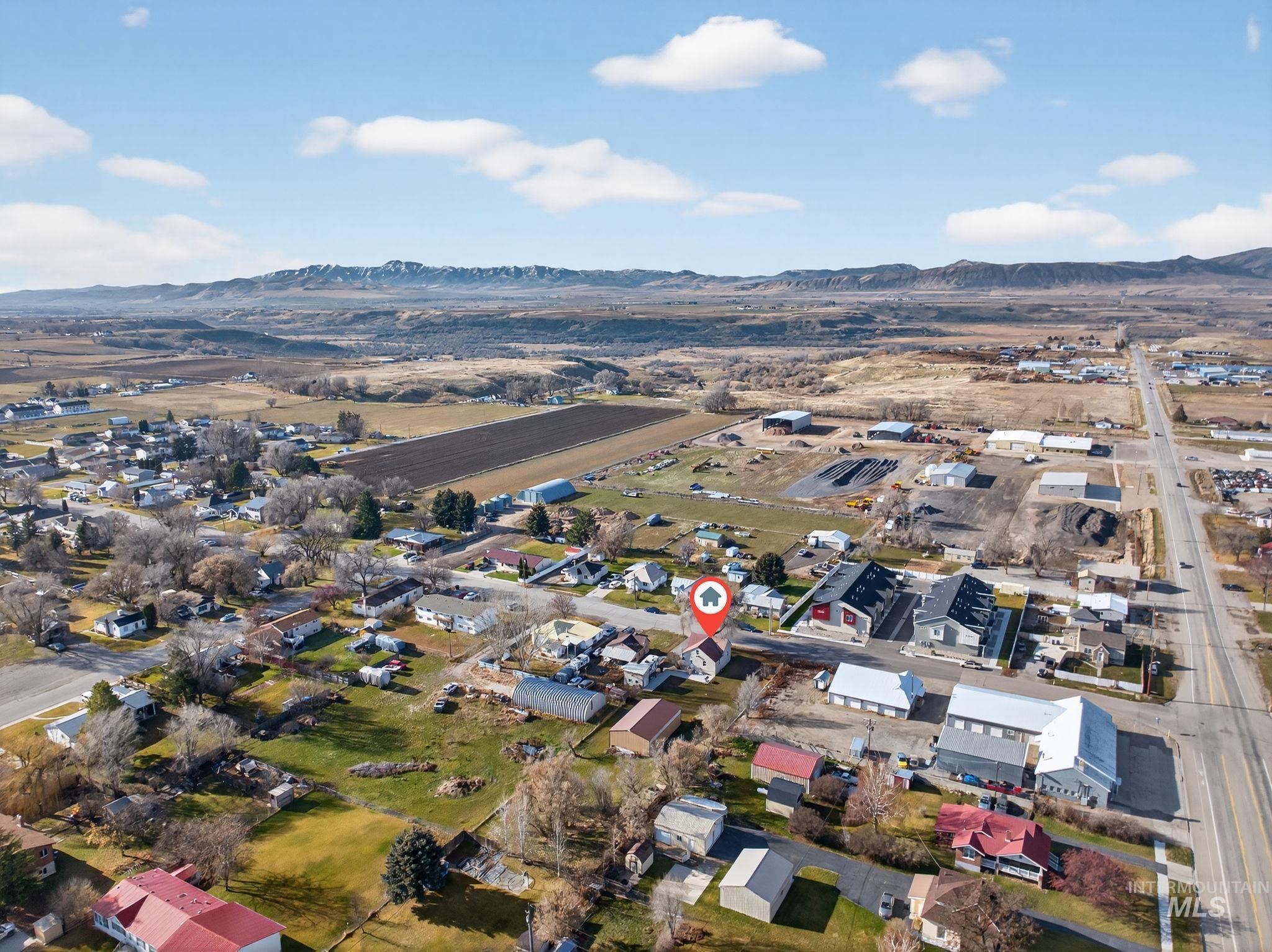 49 South 4th Street West Preston, ID 83263 - Photo 45 of 48 Aerial view of property's location with a mountain backdrop