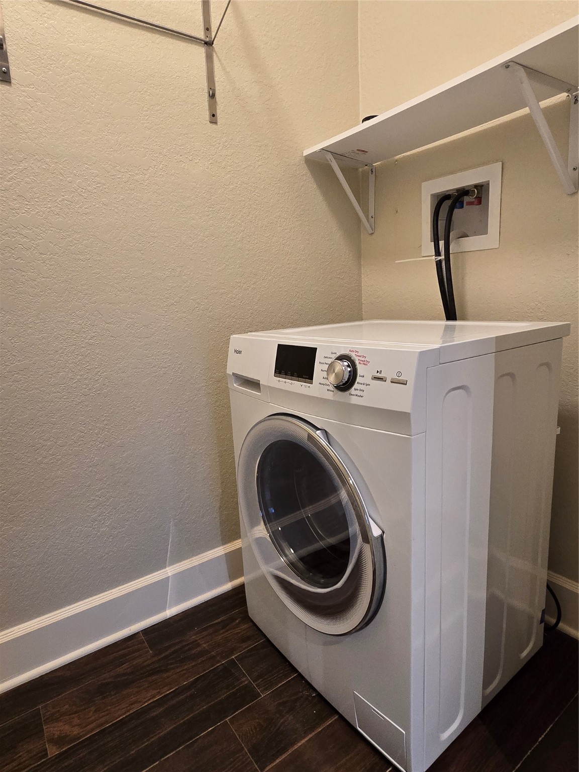 11550 Chimney Rock Road, Unit 312 Houston, TX 77035 - Photo 13 of 18 a utility room with dryer and washer