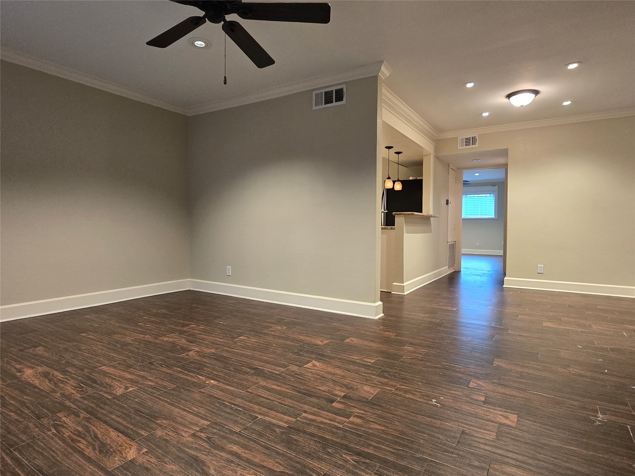 11550 Chimney Rock Road, Unit 312 Houston, TX 77035 - Photo 7 of 18 a view of an empty room with wooden floor