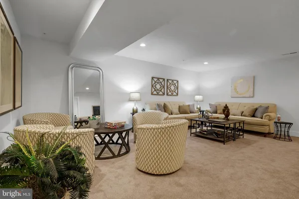 a bed room with furniture and a window