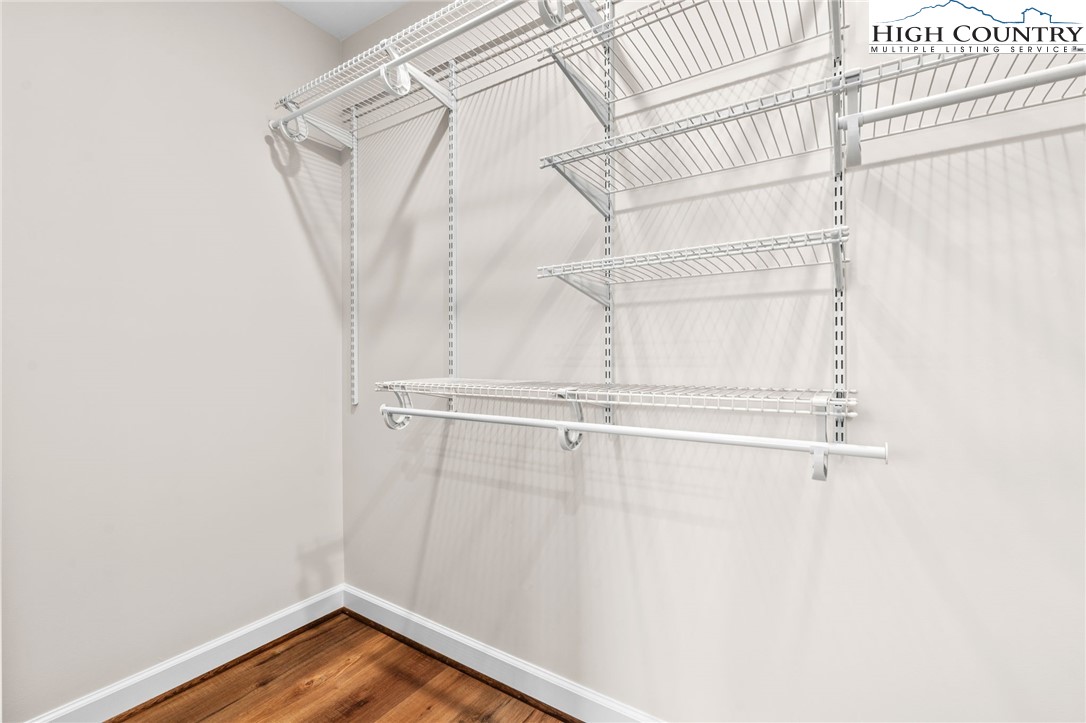 245 Ava Way, Unit 108 Boone, NC 28607 - Photo 24 of 31 a view of a room with racks on the wall
