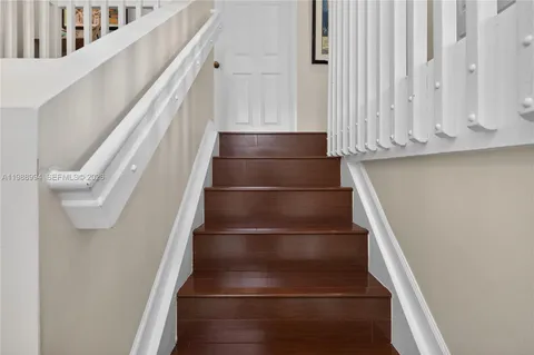 a view of entryway with wooden floor