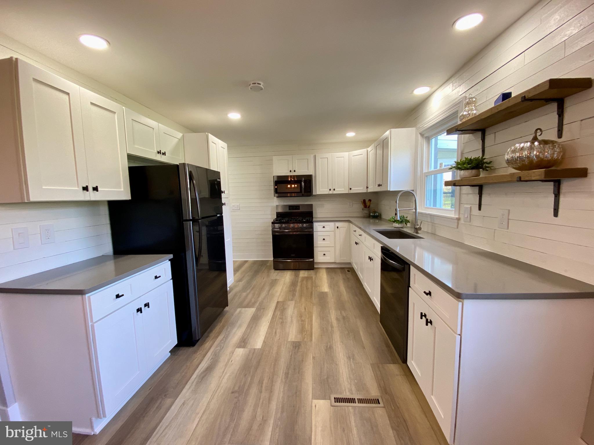 4475 East Prospect Road York, PA 17406 - Photo 10 of 29 Kitchen: white cabinets with black accent hardware