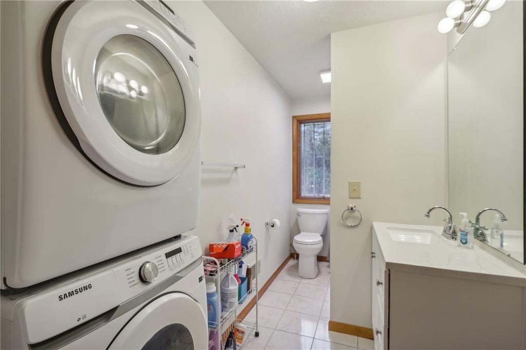 8815 Peters Road Mars, PA 16046 - Photo 31 of 39 full bathroom with stackable washer & dryernew bathroom-2024