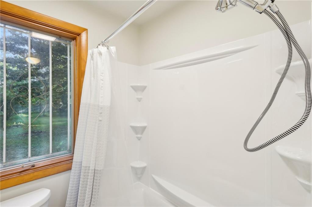 8815 Peters Road Mars, PA 16046 - Photo 32 of 39 full bathroom with stackable washer & dryernew bathroom-2024