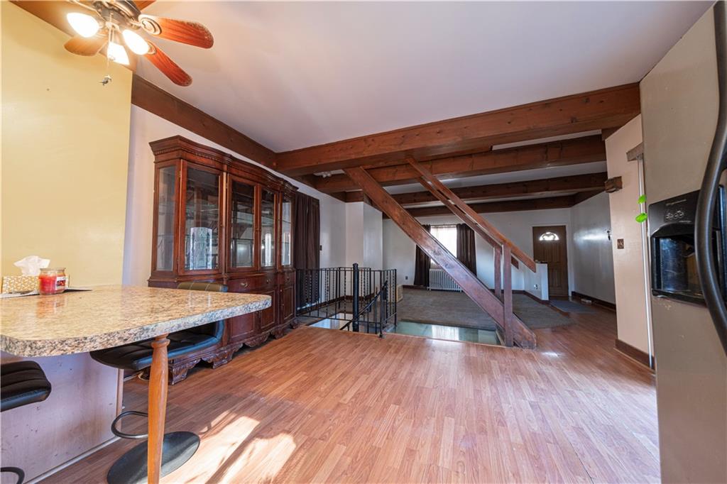 155 Ormsby Avenue Pittsburgh, PA 15210 - Photo 13 of 28 a view of a hallway with seating area and chandelier