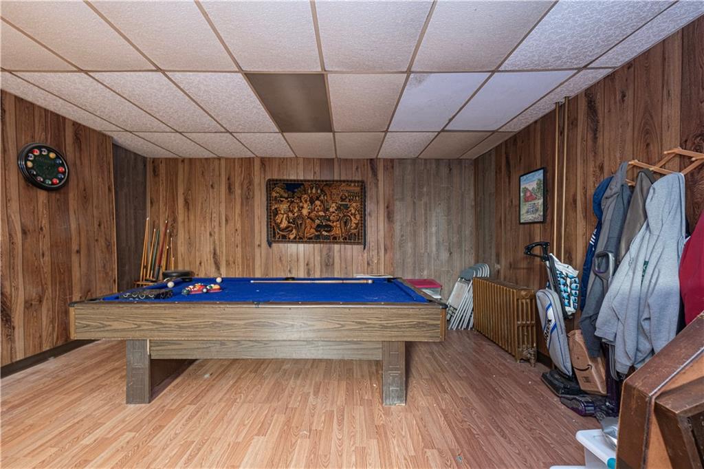 155 Ormsby Avenue Pittsburgh, PA 15210 - Photo 20 of 28 a living room with furniture and wooden floor
