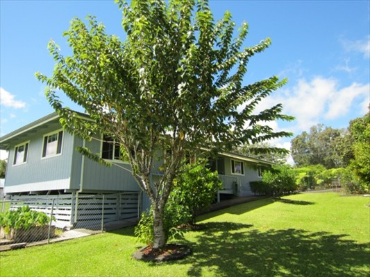 18-3976 Canney Road Mountain View, HI 96771 - Photo 20 of 25 a front view of a house with a yard