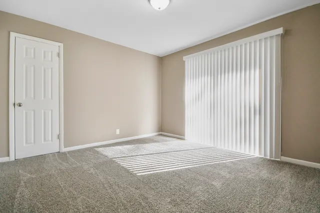 a view of a livingroom with a staircase
