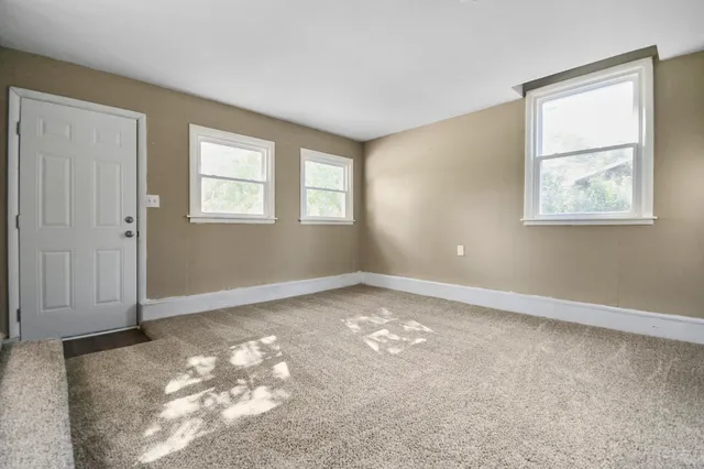 an empty room with a window