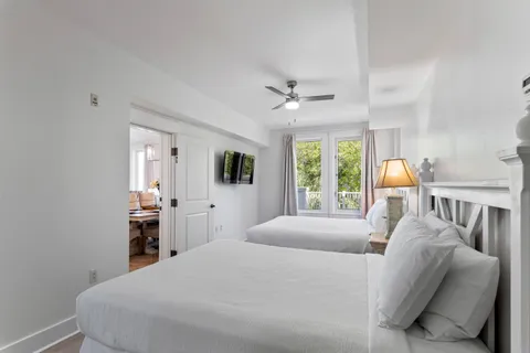 a bedroom with a bed and a fireplace