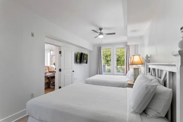 a bedroom with a bed and a fireplace