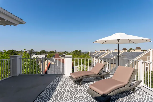 a view of a patio with a bench