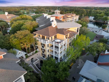 a view of a swimming pool with a yard