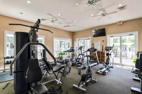 a terrace with outdoor seating and city view