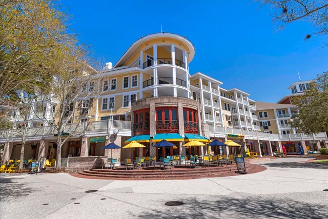 a view of a backyard with large trees