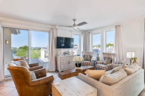 a kitchen with granite countertop a sink a stove and cabinets