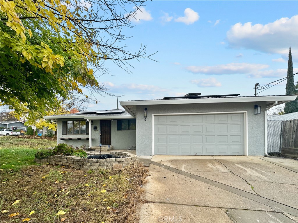 15 Regent Loop Oroville, CA 95966 - Photo 2 of 22 a front view of a house with a yard