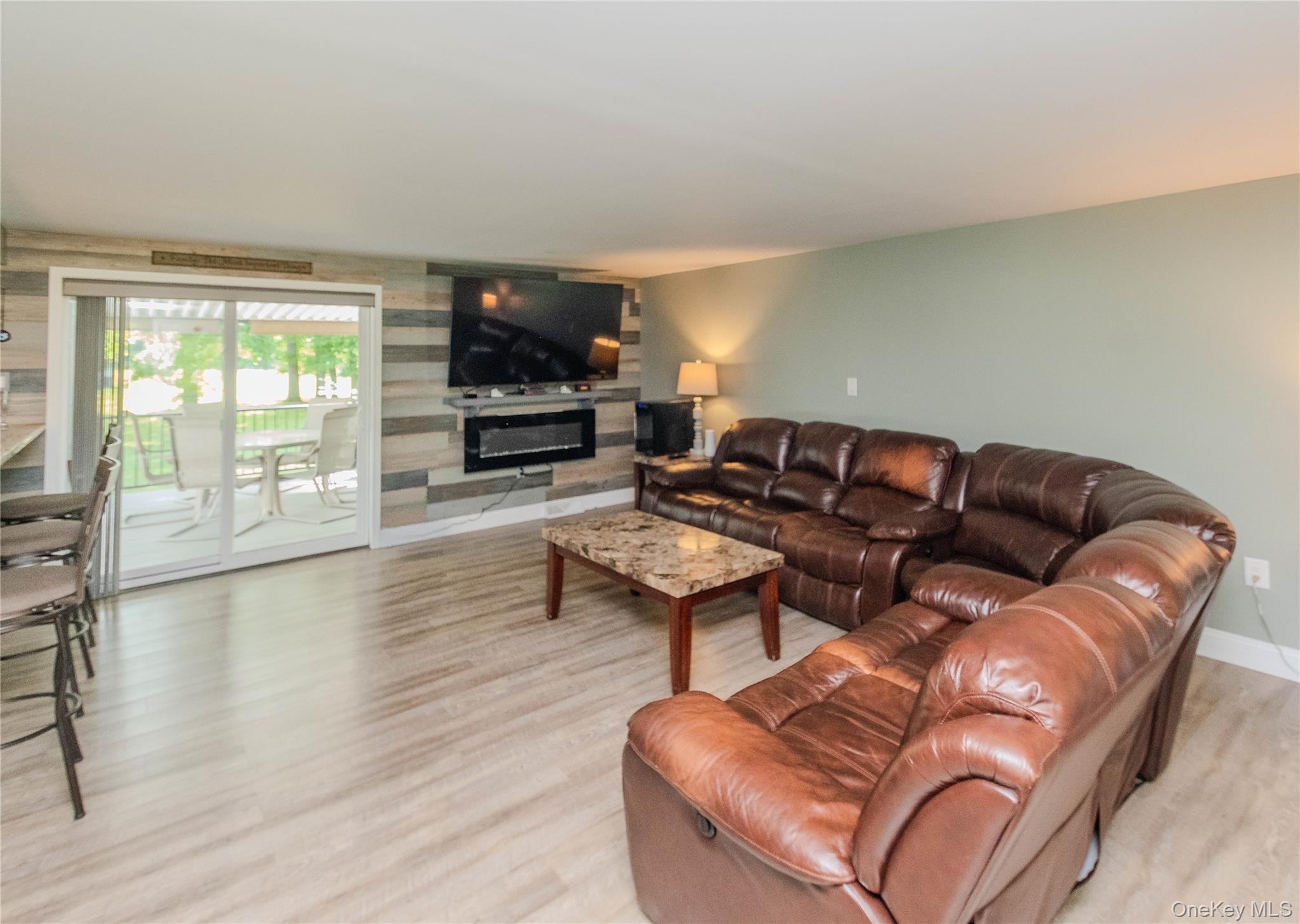 15 Van Dewark Road Middletown, NY 10941 - Photo 3 of 41 Living room leading to back Tres deck