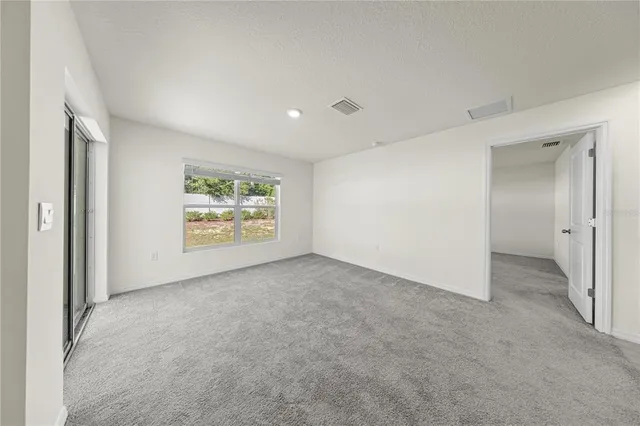 a kitchen with granite countertop cabinets and stainless steel appliances