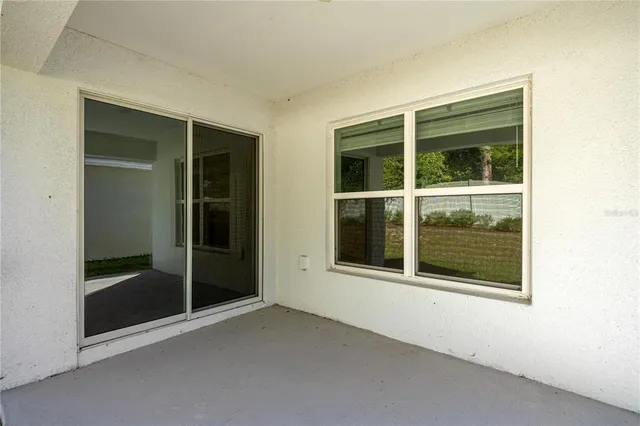 a view of a house with backyard