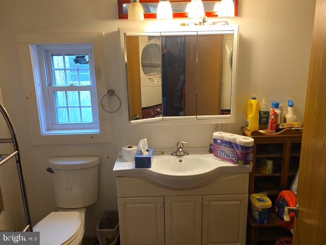 100 Mill Street Trout Run, PA 17771 - Photo 9 of 17 a bathroom with a sink toilet and a mirror