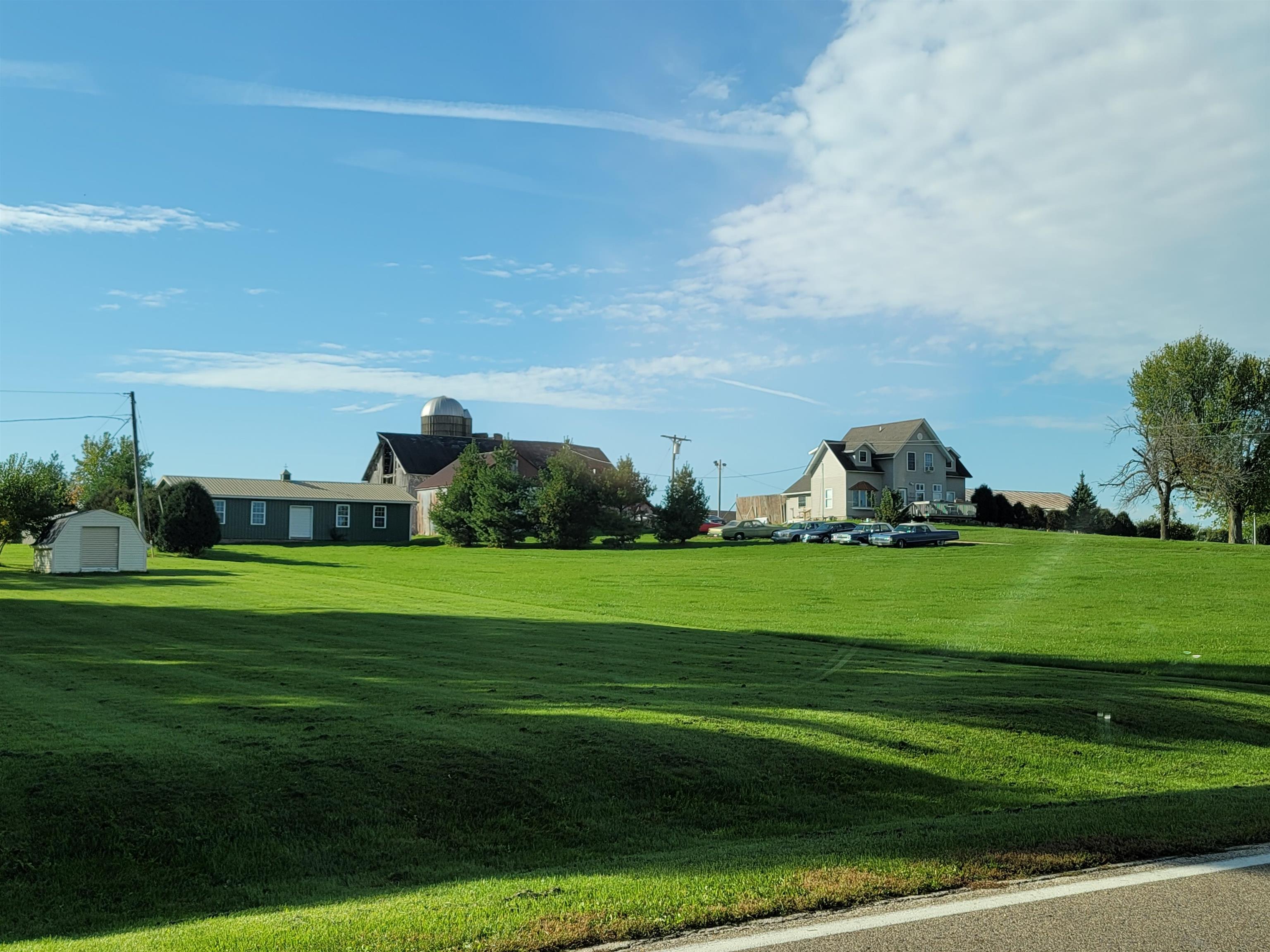 2349 Graham Road Belvidere, IL 61008 - Photo 5 of 5 a view of a grassy field with houses