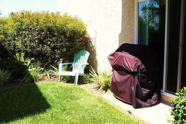 a view of a chairs and table on the terrace