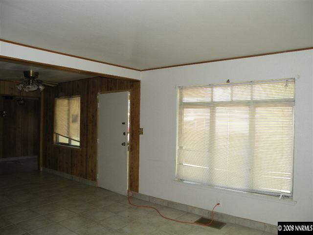 1735 Auburn Way Reno, NV 89502 - Photo 3 of 9 a view of an empty room with a window