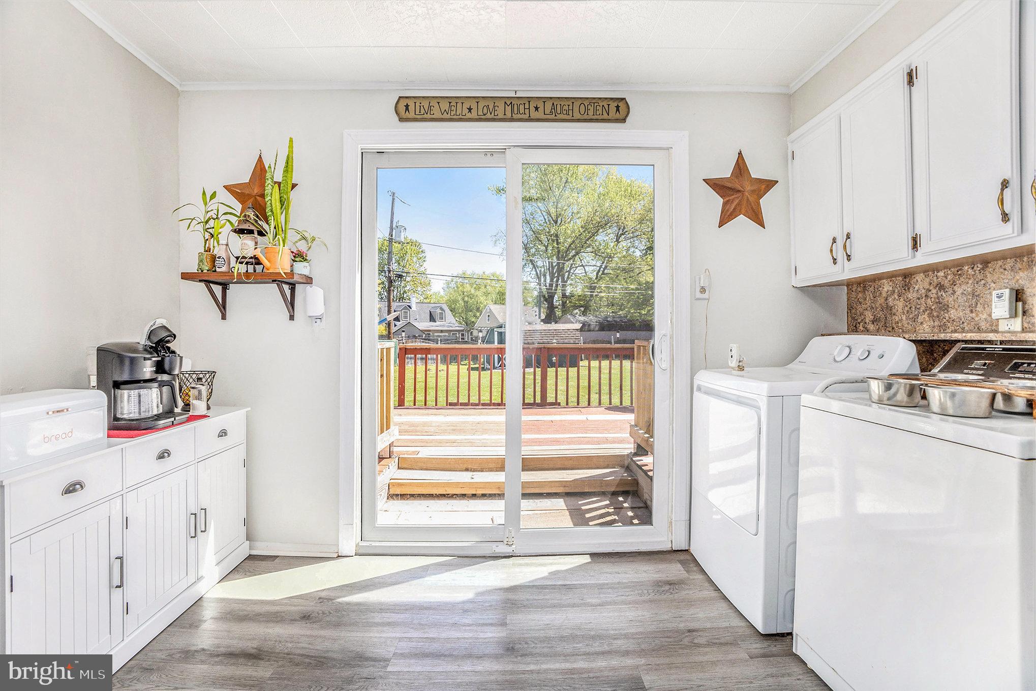 25 Constitution Avenue Eagleville, PA 19403 - Photo 11 of 24 a storage room with wooden floor washer and dryer