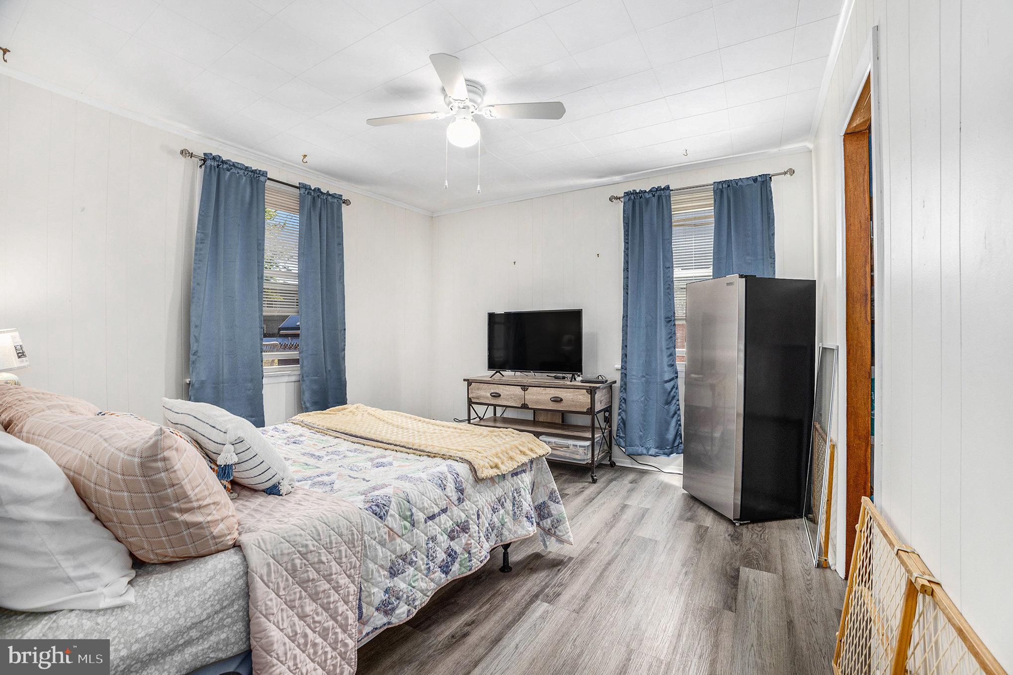 25 Constitution Avenue Eagleville, PA 19403 - Photo 12 of 24 a bedroom with a bed and a flat screen tv