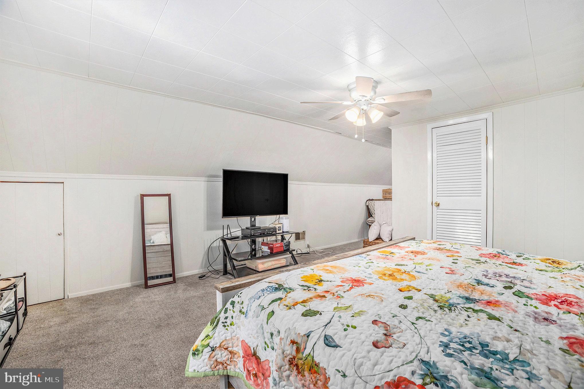 25 Constitution Avenue Eagleville, PA 19403 - Photo 16 of 24 a bedroom with a bed and a flat screen tv
