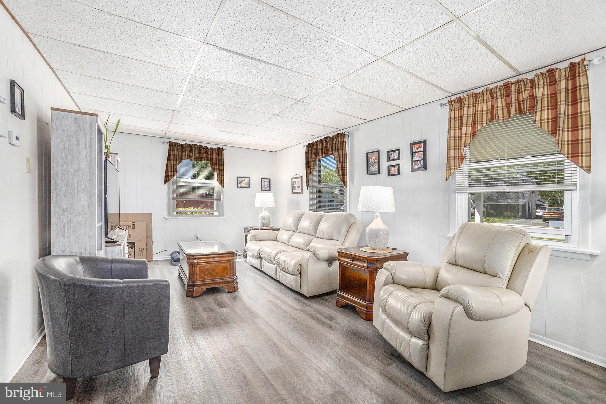 25 Constitution Avenue Eagleville, PA 19403 - Photo 3 of 24 a living room with furniture and a large window