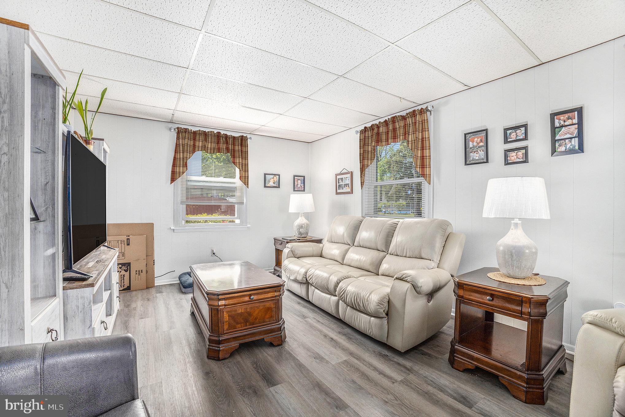 25 Constitution Avenue Eagleville, PA 19403 - Photo 4 of 24 a living room with furniture and a flat screen tv