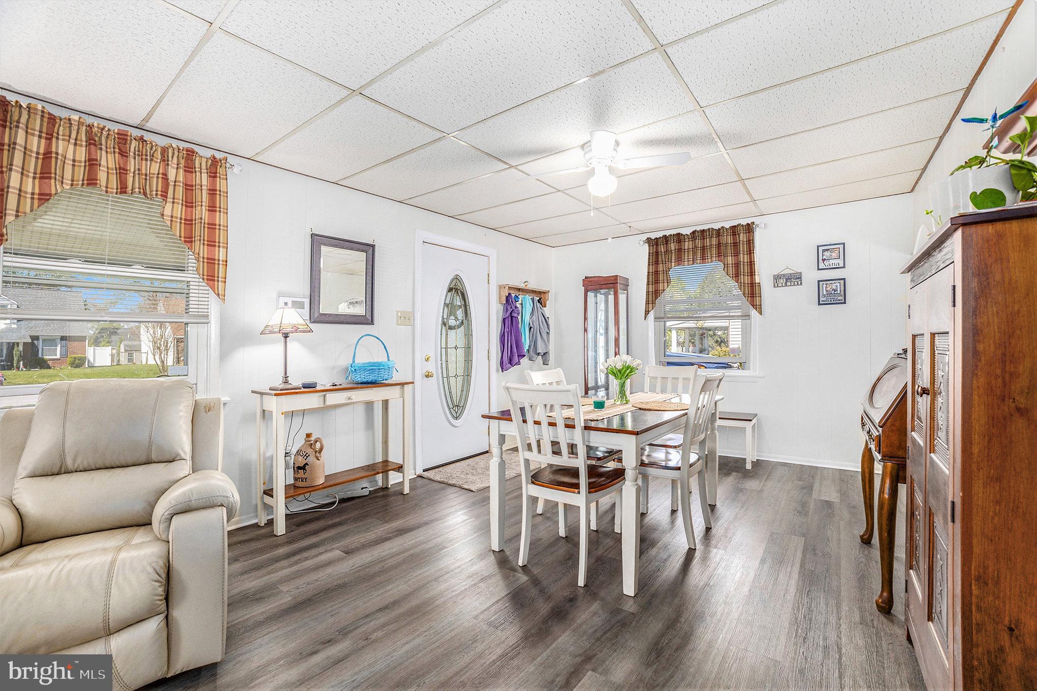 25 Constitution Avenue Eagleville, PA 19403 - Photo 6 of 24 a living room with furniture a flat screen tv and a wooden floor
