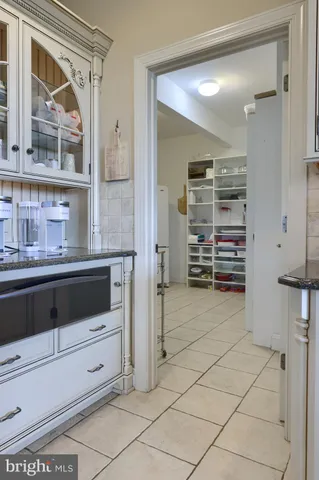 an aerial view of a golf course with parking space