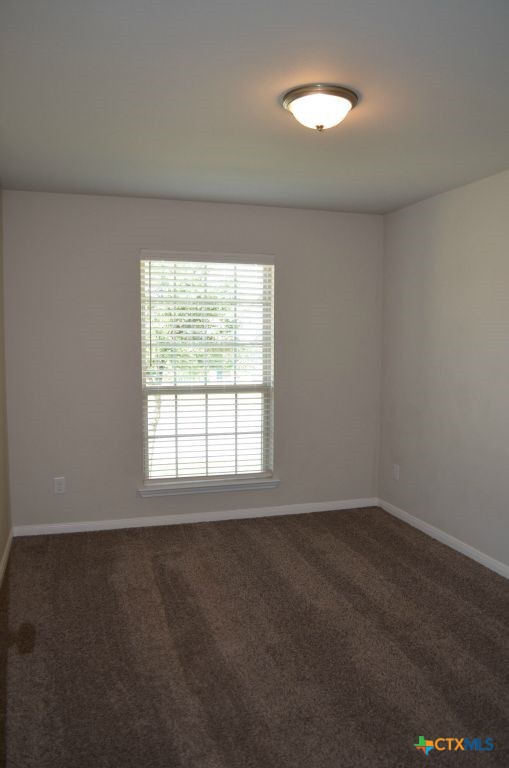 3414 Addison Street Killeen, TX 76542 - Photo 17 of 36 an empty room with a window