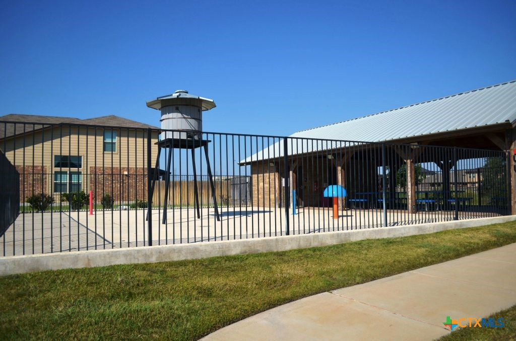 3414 Addison Street Killeen, TX 76542 - Photo 2 of 36 a view of a house with a small yard and a large tree