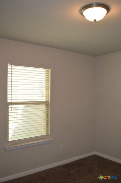 3414 Addison Street Killeen, TX 76542 - Photo 25 of 36 a view of an empty room with wooden floor and a window