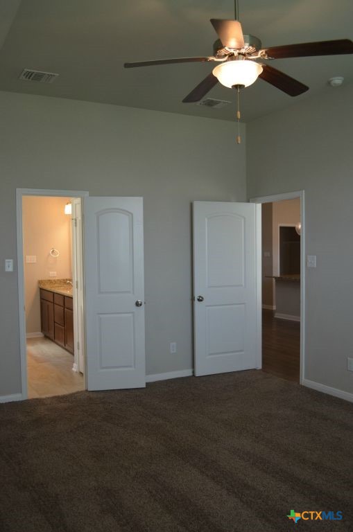 3414 Addison Street Killeen, TX 76542 - Photo 30 of 36 a view of a livingroom with a chandelier fan