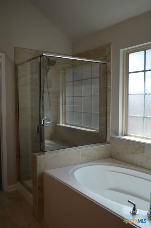 3414 Addison Street Killeen, TX 76542 - Photo 33 of 36 a bathroom with a bathtub and a shower