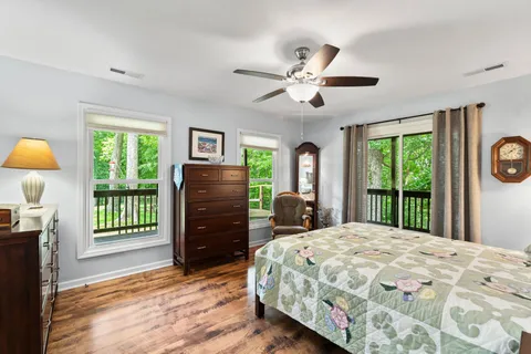 a view of a balcony with wooden floor