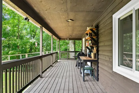 a view of a chairs and table on the wooden floor