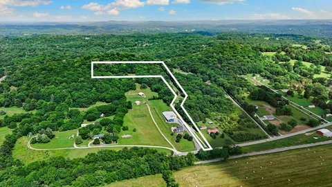 a view of yard with small pool