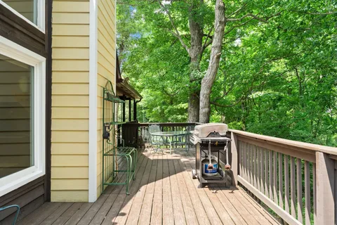 a house with swimming pool in front of it