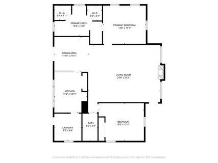 a view of a house with a yard and a large tree