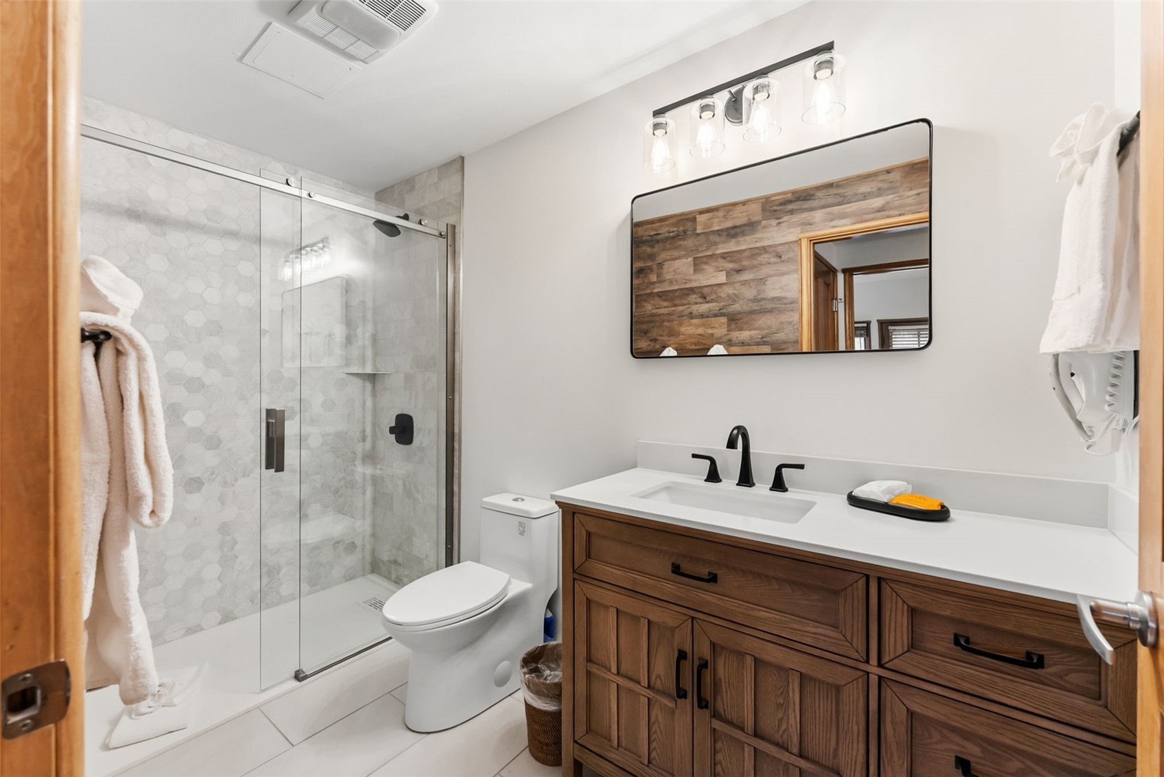 195 River Run Road, Unit 8015 Keystone, CO 80435 - Photo 19 of 35 a bathroom with a sink a toilet and shower
